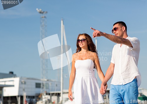 Image of smiling couple in city