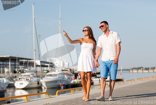 Image of smiling couple in city