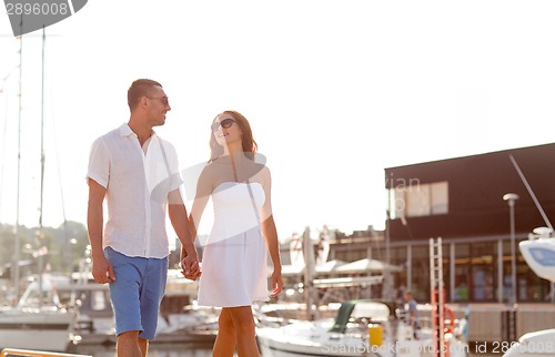 Image of smiling couple in city