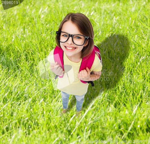 Image of happy smiling teenage girl in eyeglasses with bag