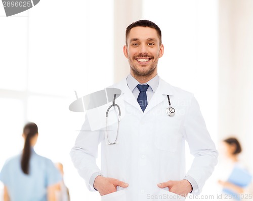 Image of smiling male doctor with stethoscope