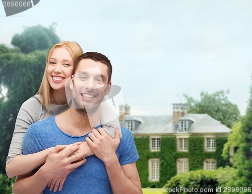 Image of smiling couple hugging