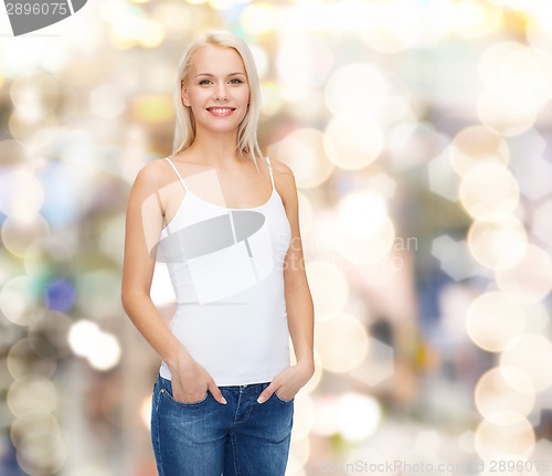 Image of smiling woman in blank white t-shirt