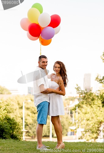 Image of smiling couple in city