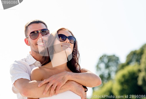 Image of smiling couple in city