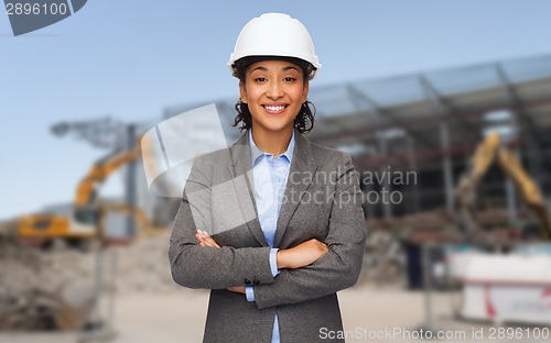 Image of african american businesswoman in white helmet