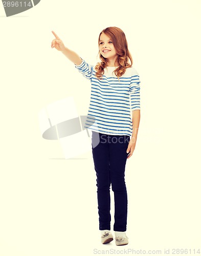 Image of girl pointing at imaginary screen