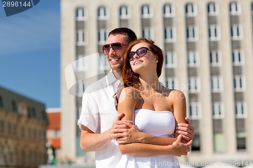 Image of smiling couple in city