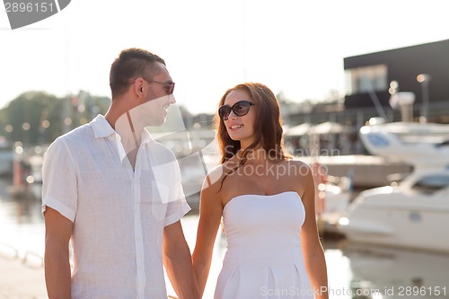 Image of smiling couple in city