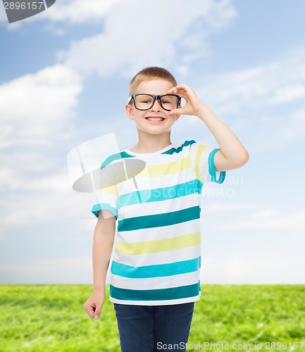 Image of smiling little boy in eyeglasses