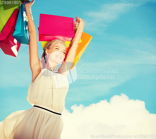 Image of woman with shopping bags