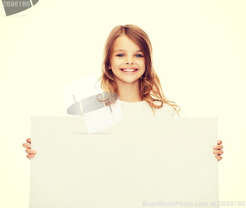 Image of smiling little girl with blank white board