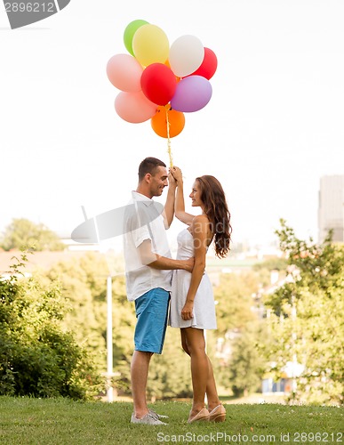 Image of smiling couple in city