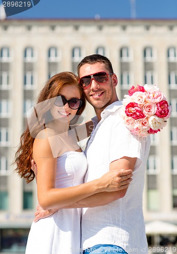 Image of smiling couple in city