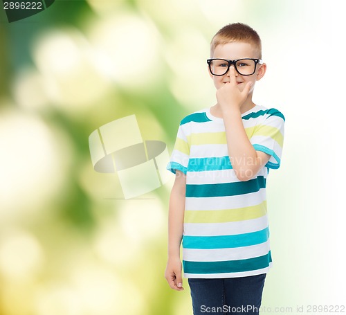 Image of smiling little boy in eyeglasses