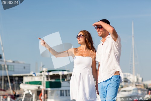 Image of smiling couple in city