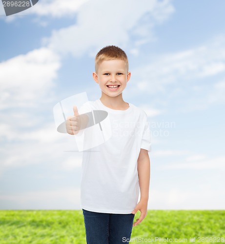 Image of smiling little boy in white blank t-shirt