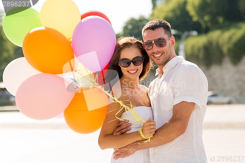 Image of smiling couple in city