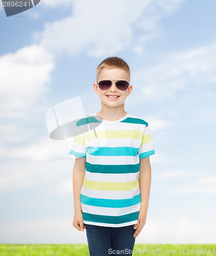 Image of smiling cute little boy in sunglasses