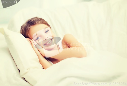 Image of little girl sleeping at home