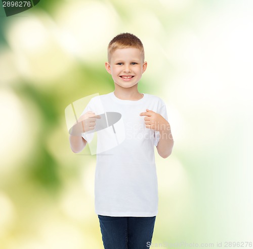 Image of smiling little boy in white blank t-shirt