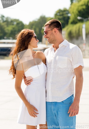 Image of smiling couple in city