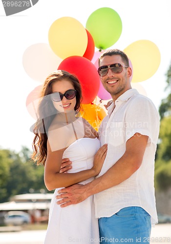 Image of smiling couple in city