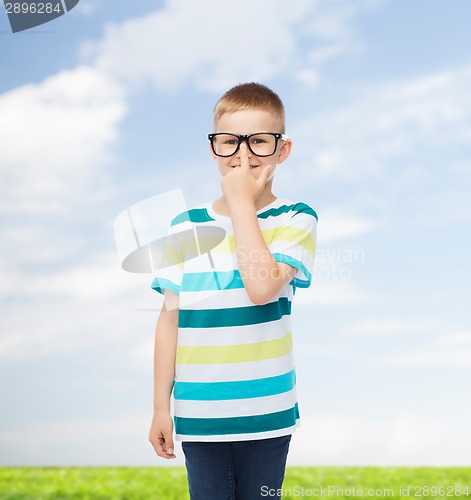 Image of smiling little boy in eyeglasses