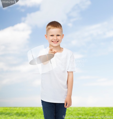 Image of smiling little boy in white blank t-shirt