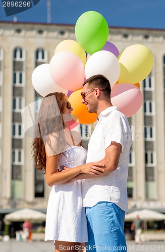 Image of smiling couple in city