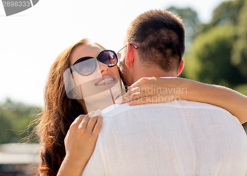 Image of smiling couple in city