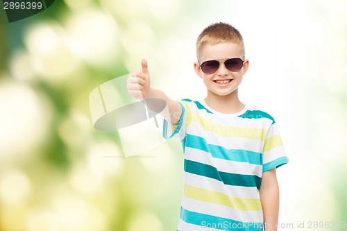 Image of smiling cute little boy in sunglasses