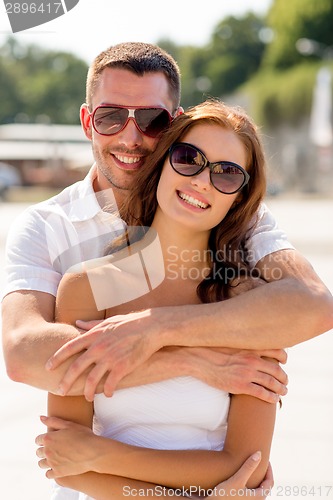 Image of smiling couple in city