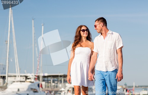 Image of smiling couple in city