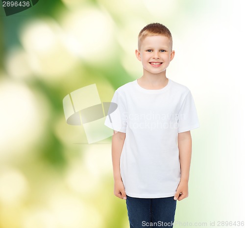 Image of smiling little boy in white blank t-shirt