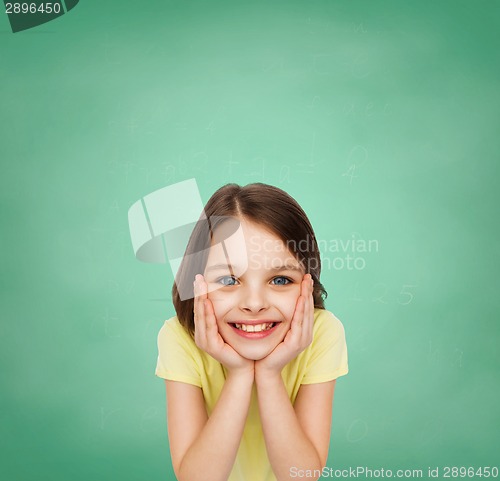 Image of smiling little girl over white background