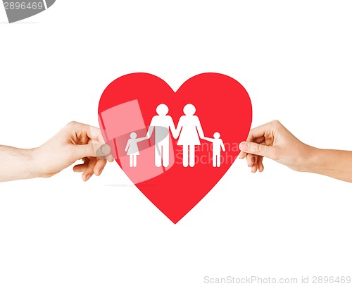 Image of couple hands holding red heart with family