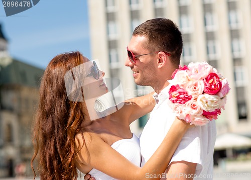 Image of smiling couple in city