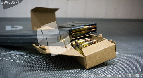 Image of Rifle and bullets