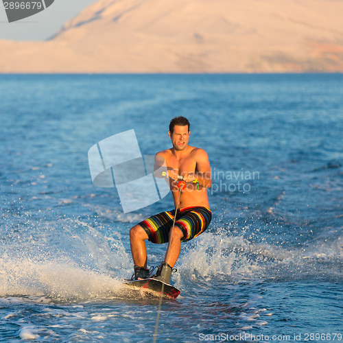 Image of Wakeboarder in sunset.