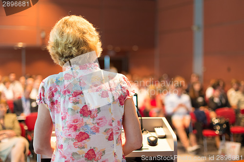 Image of Female academic professor lecturing.