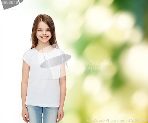 Image of smiling little girl in white blank t-shirt