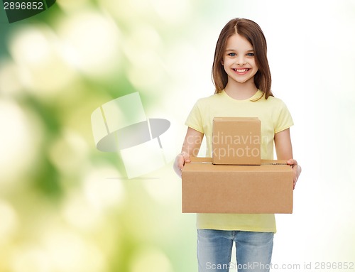 Image of smiling little girl in white blank t-shirt