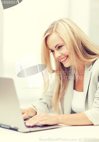 Image of businesswoman with laptop