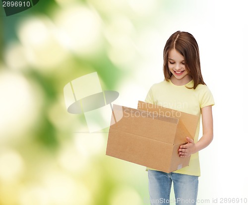 Image of smiling little girl in white blank t-shirt