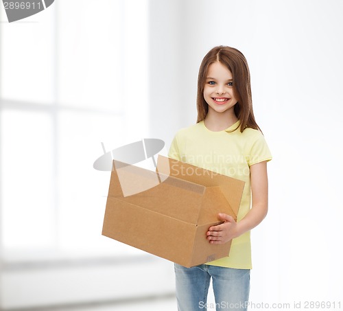 Image of smiling little girl in white blank t-shirt