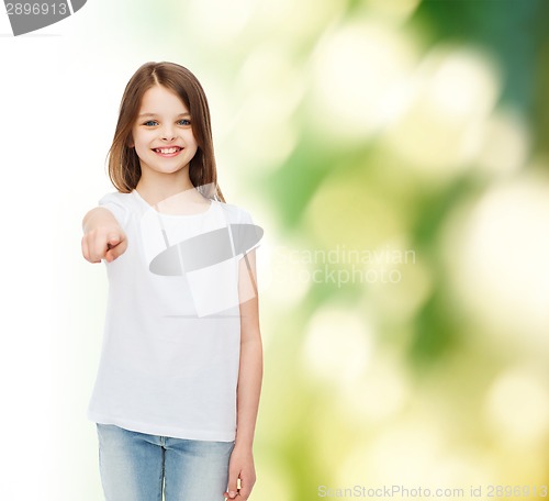 Image of smiling little girl in white blank t-shirt