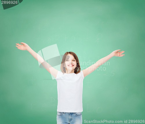 Image of smiling little girl in white blank t-shirt