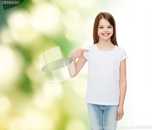 Image of smiling little girl in white blank t-shirt