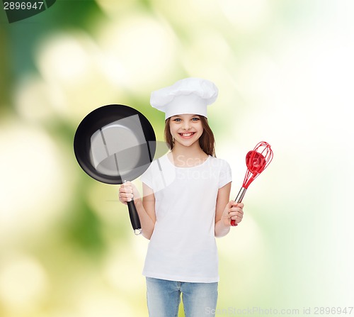 Image of smiling little girl in white blank t-shirt